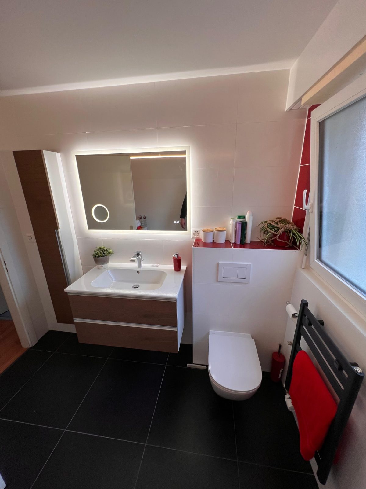 Meuble vasque d'une salle de bain rénovée par AJ Sanitaire – Valais / Vaud